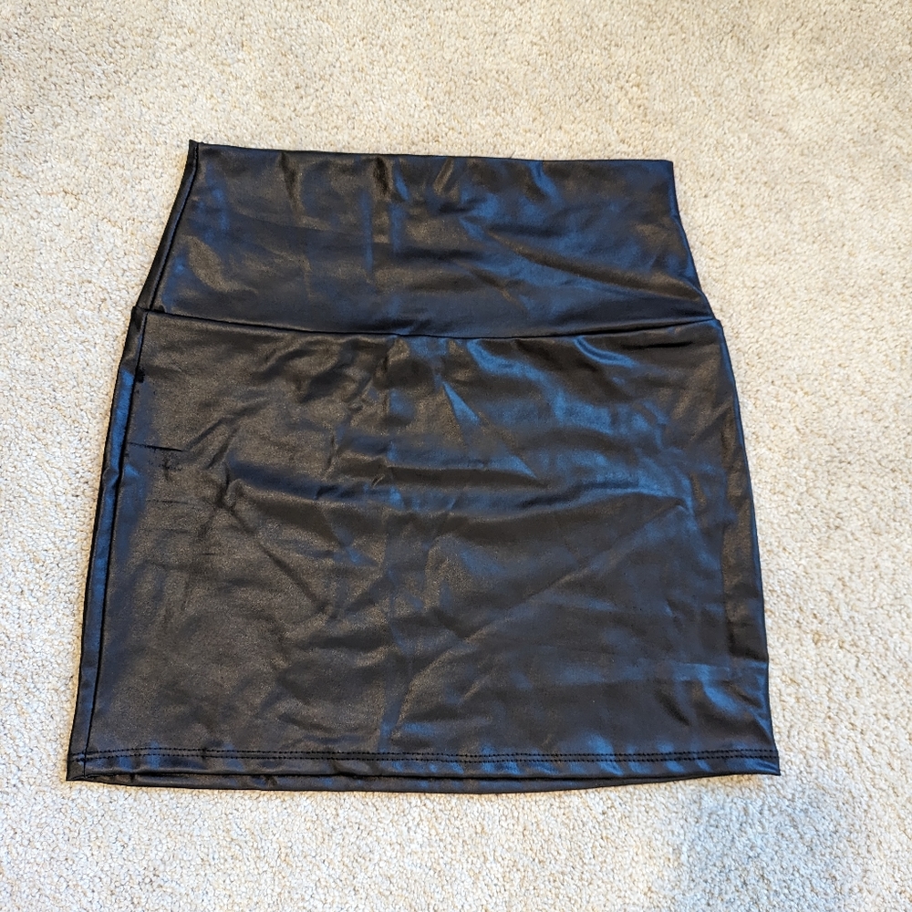 Black leather mini skirt